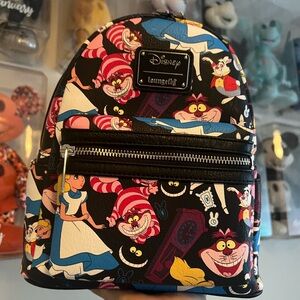 NEW WITH TAGS Loungefly Disney Alice In Wonderland Mini Backpack!!!